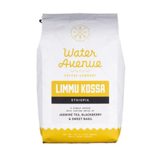 Load image into Gallery viewer, Coffee bag from Water Avenue Coffee Company with yellow and white design
