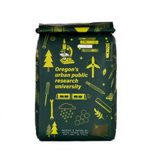 Load image into Gallery viewer, Coffee bag with green and yellow design featuring icons and text on a white background

